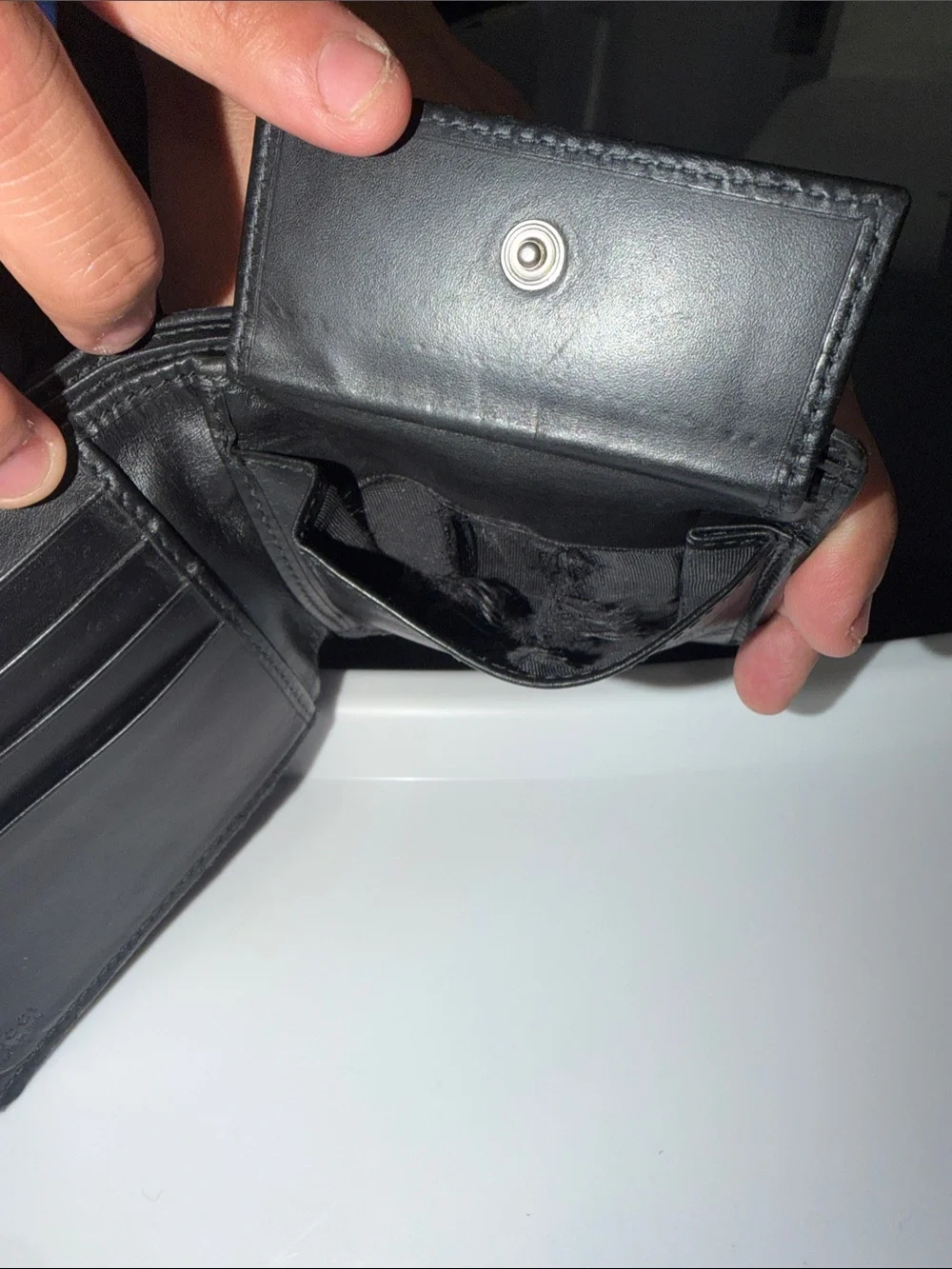 Gucci Black Embossed Interlocking G Leather Bi-Fold Wallet